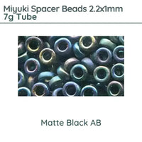 Miyuki Spacer Beads, 2.2x1mm, 7g Tube, Matte Black AB - The Argus Collection