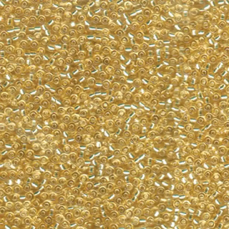 Close-up of gold beads with a slight sheen