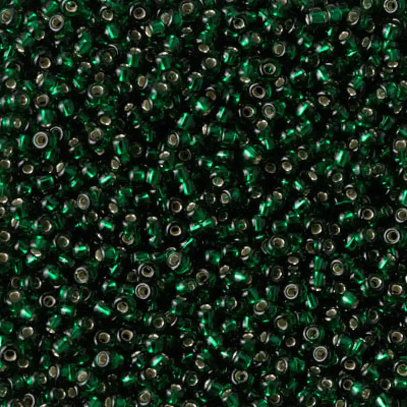 Close-up of green metallic beads