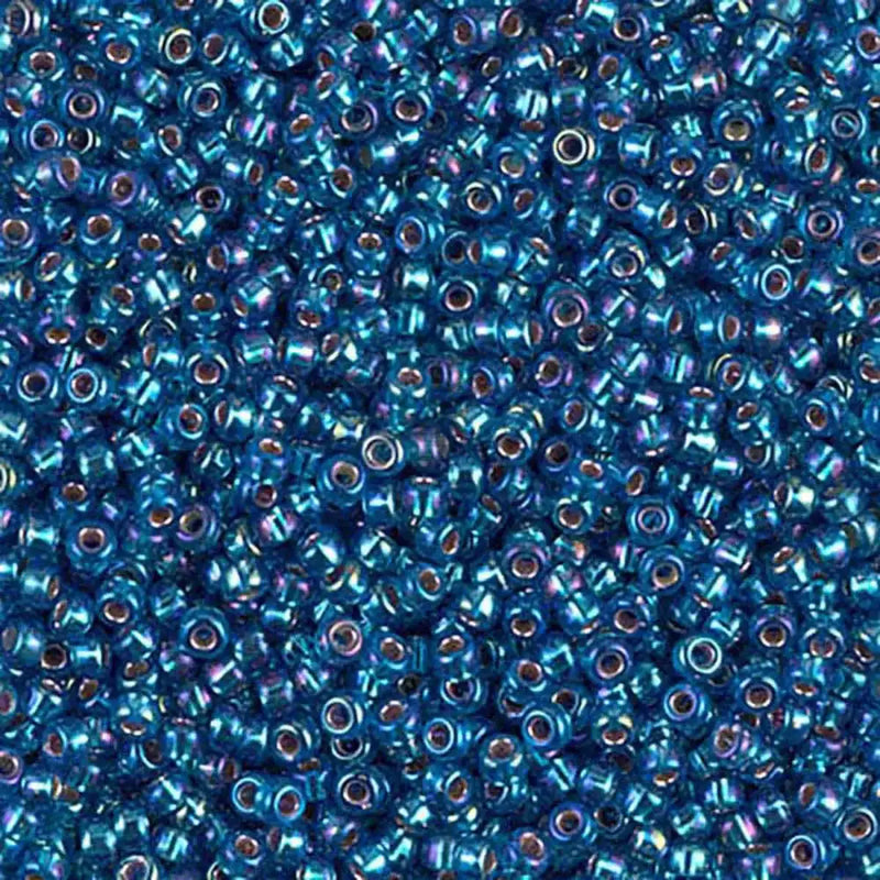 Miyuki 11/0 Seed Beads, 11-1025, Silver Lined Capri Blue AB, 10g - The Argus Collection