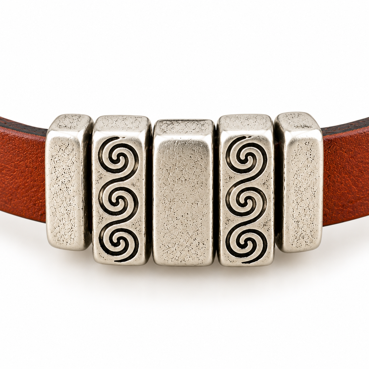 Example of 5mm Crimp Bar Sliders securing decorative sliders on brown flat leather