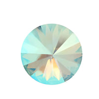 Close-up of a round cut aqua shimmer crystal with blue and yellow reflections