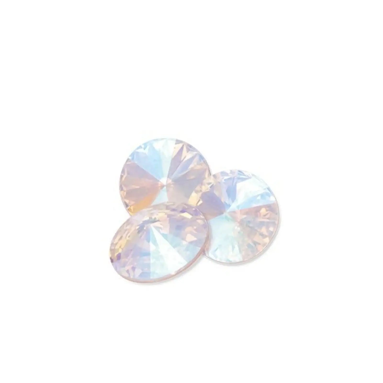 Three round faceted crystal rhinestones with iridescent shimmer on white background