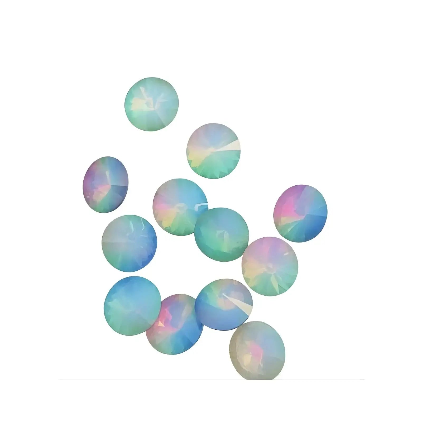 Scattered translucent round opal gemstones with iridescent colors on white background