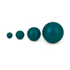 Four glossy petrol blue pearls of increasing sizes arranged in a row on white background