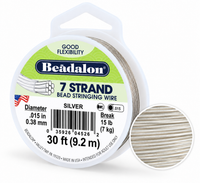 Beadalon 7 Strand Bead Stringing Wire in silver, 15 lb, 30 ft length, shown in its white plastic spool with a circular inset showing the wire strands.