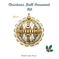Christmas ball ornament kit with gold and white design on a white background
