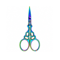 Chroma Series 3.5-inch embroidery scissors by The Beadsmith with rainbow titanium-coated stainless steel blades and decorative handles on a white background