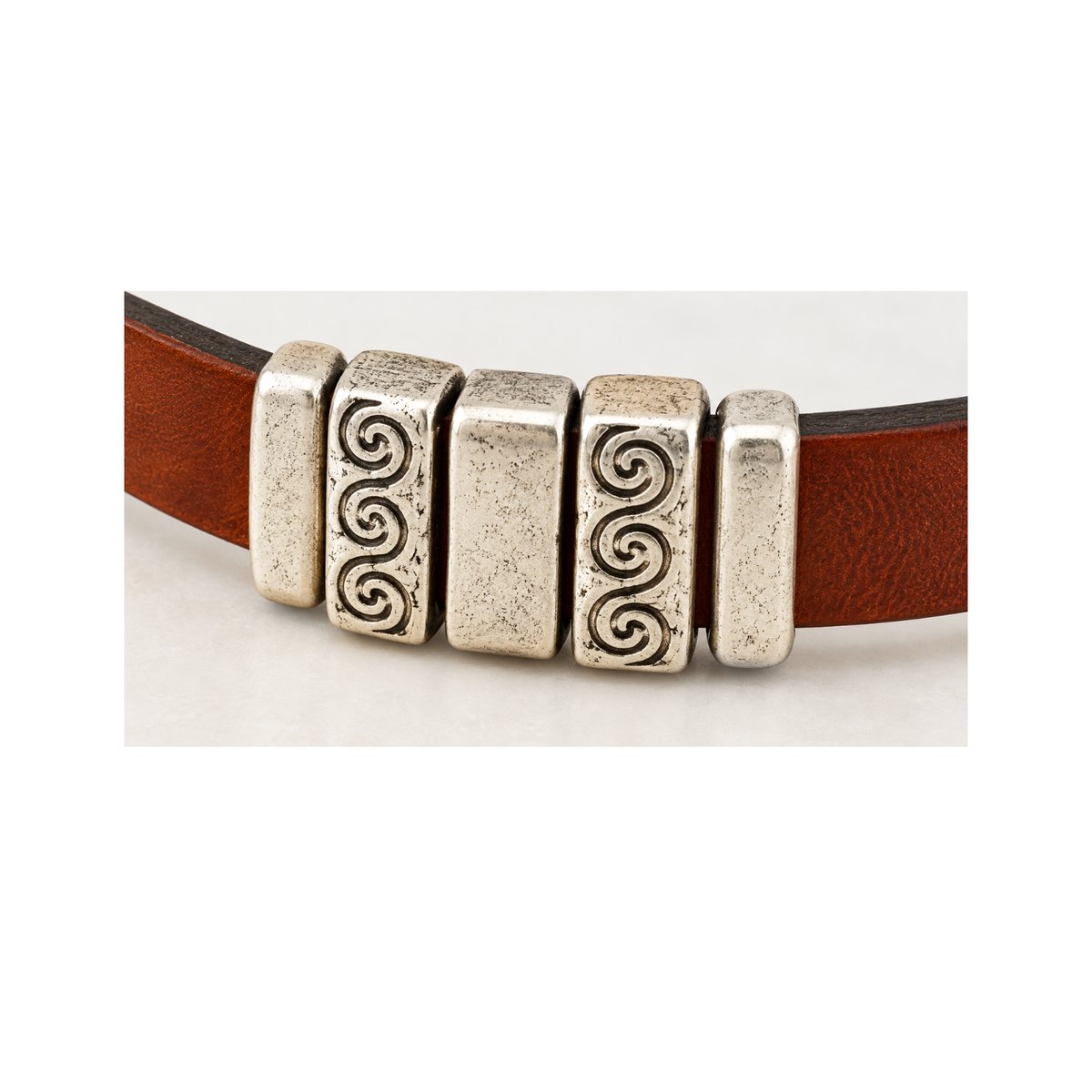 Example leather bracelet design using 10mm Crimp Bar Sliders to hold decorative sliders in place