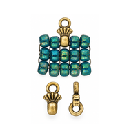 Cymbal Pilos 8/0 bead ending in Antique Brass Plate, shown with teal seed beadwork and front and side views of the decorative metal connector.