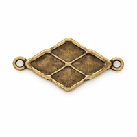 Bronze-colored jewelry connector with four square sections on a white background