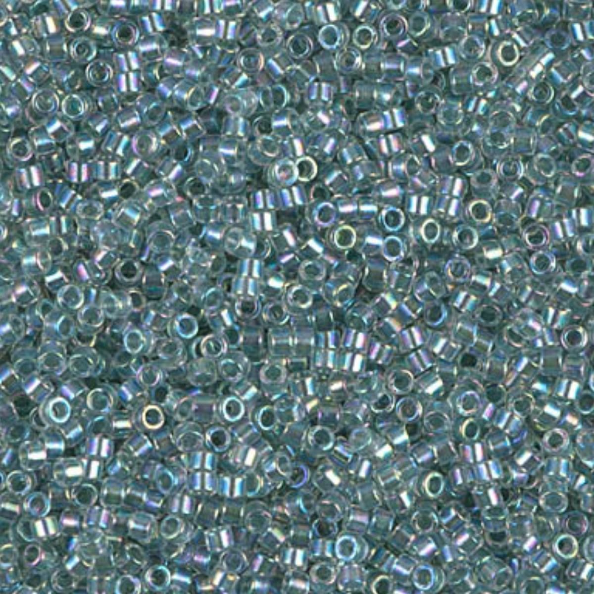 Close-up of small turquoise beads with a subtle iridescent sheen.
