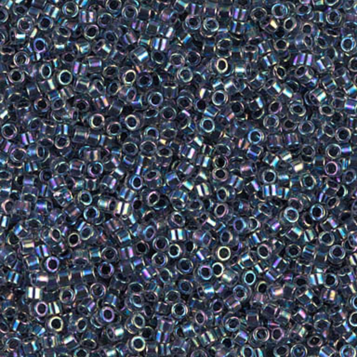 Close-up of small metallic beads with a multicolor iridescent finish.