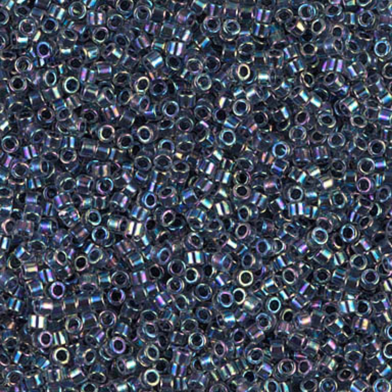 Close-up of small metallic beads with a multicolor iridescent finish.