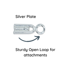 Silver-plated crimp end with a sturdy open loop on a white background