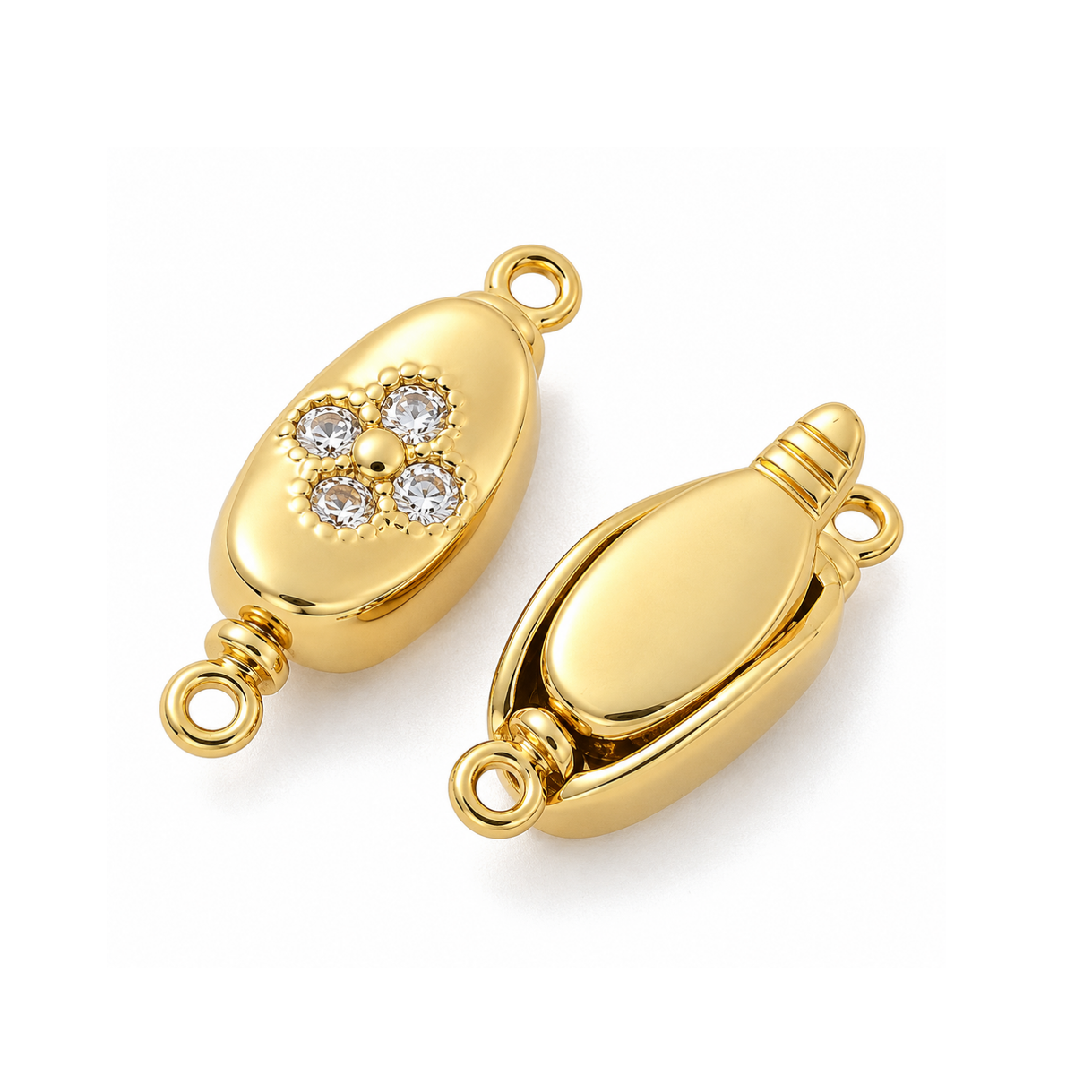 Gold Elara pinch release bayonet peanut clasp showing front cubic zirconia detail and clasp mechanism