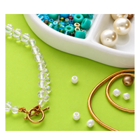 Gold French Wire and beading supplies demonstrating jewelry clasp finishing techniques