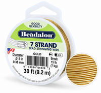 Beadalon 7 strand gold beading wire spool with a white plastic hanger spool and a circular inset showing the gold wire texture, on a white background.