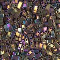 Close-up of shiny two-hole rectangular metallic beads with iridescent purple and gold finish