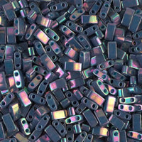 Close-up of iridescent small rectangular beads with two holes, used for jewelry making