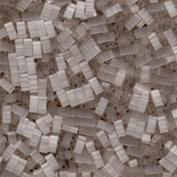 Close-up of transparent crystal glass beads with rectangular shapes arranged randomly
