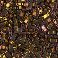 Close-up of metallic rectangular beads with two holes, exhibiting iridescent gold and purple hues