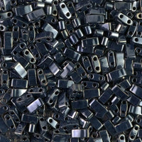 Close-up of shiny black rectangular two-hole beads for DIY jewelry making