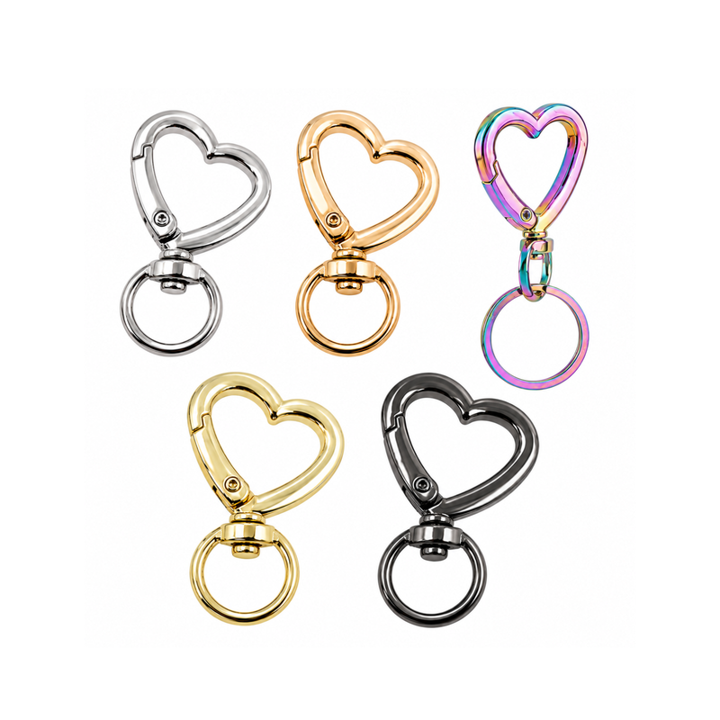Heart lobster clasps with keyrings in silver plate, warm gold, gold plate, gunmetal and rainbow finishes for bag charms and keychains.