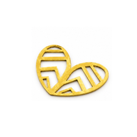 A gold-colored metal heart-shaped brooch with geometric cutout patterns, displayed on a clean white background.