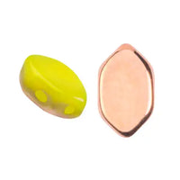 Two 2-hole glass beads, yellow and rose gold, on a white background