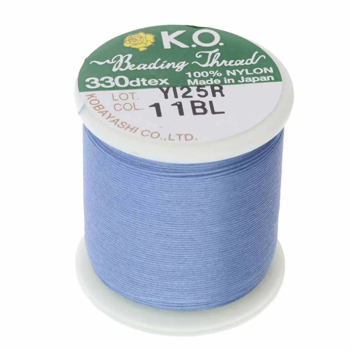 Spool of K.O. beading thread on a white background