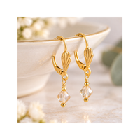 Monaco 11 gold leaf-design leverback ear wires with delicate crystal bicone dangles attached through the bottom loops