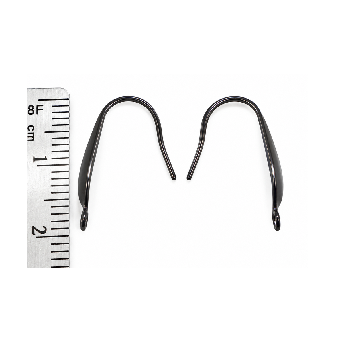 Monaco 5 black surgical steel ear wires shown beside a centimetre ruler to demonstrate their 20.5 mm length