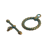 Bronze and turquoise twisted ring and bar toggle on a white background