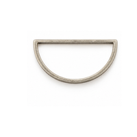 A silver-toned metal D-ring with a textured, antiqued finish, shown against a plain white background.