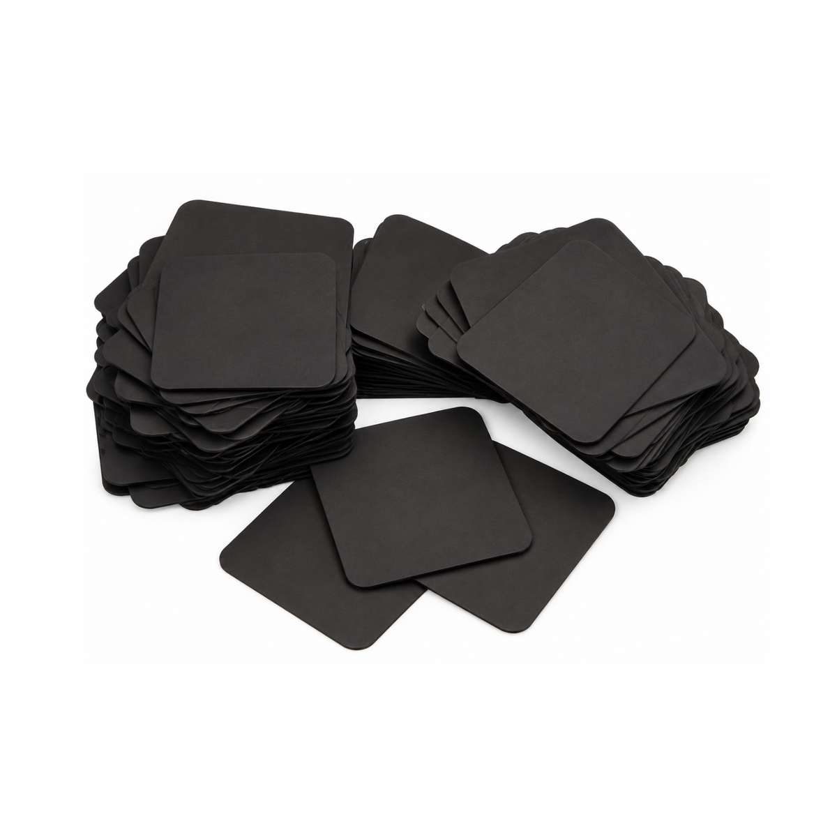 Stack of black Shine-Rite 1 x 1 inch anti-tarnish tabs for jewelry and metal storage.