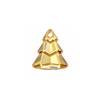 Swarovski crystal Christmas tree pendant in Crystal Brandy with warm golden and tangerine reflections, 15 × 13 mm