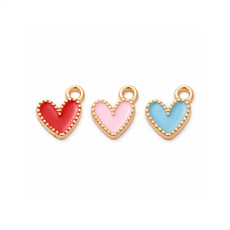 Sweetheart enamel heart charms in Red, Pink and Sky Blue with gold-tone trim on a white background