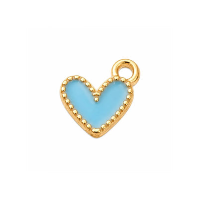 Blue enamel heart charm with gold-tone trim on a white background