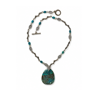 Finished necklace featuring a TierraCast Botanical Leaf Pinch Bail with a teal stone pendant, leaf beads and antique silver findings.