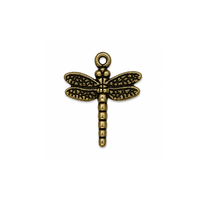 TierraCast 15mm dragonfly charm in Antique Brass finish on a white background.