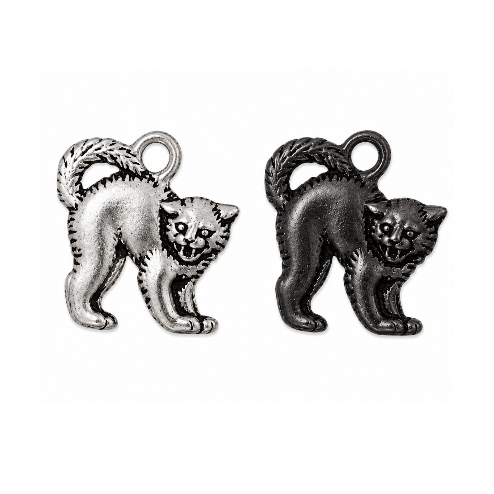 Two small metallic animal charms shaped like walking cats, shown side by side on a plain white background. One charm is silver-toned and the other is dark gunmetal/black-toned, both with loop tops for attachment.