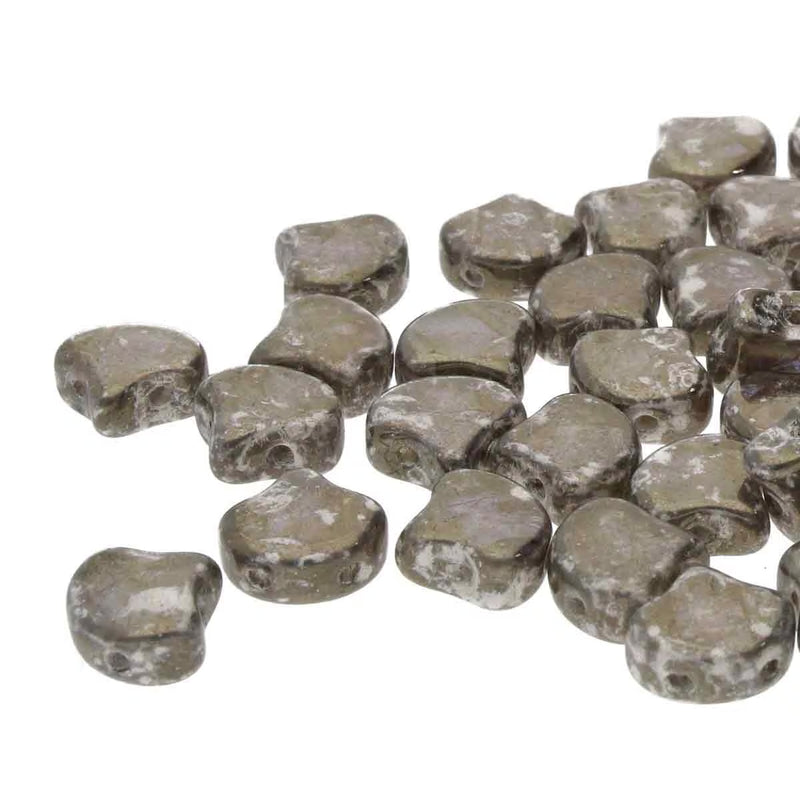 Collection of stone-like beads on a white background