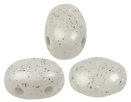 Three speckled white 2-hole beads on a white background