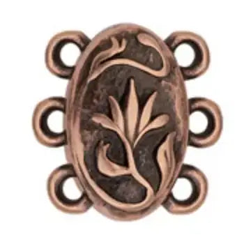Decorative copper clasp with intricate design on a white background