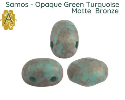 Three metallic 2-hole beads with a textured surface on a white background, labeled 'Samos - Opaque Green Turquoise Matte Bronze'.