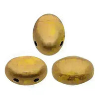 Three gold-colored 2-hole beads on a white background